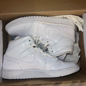 Jordan Women’s All-White Patent Leather High-Top Sneakers
